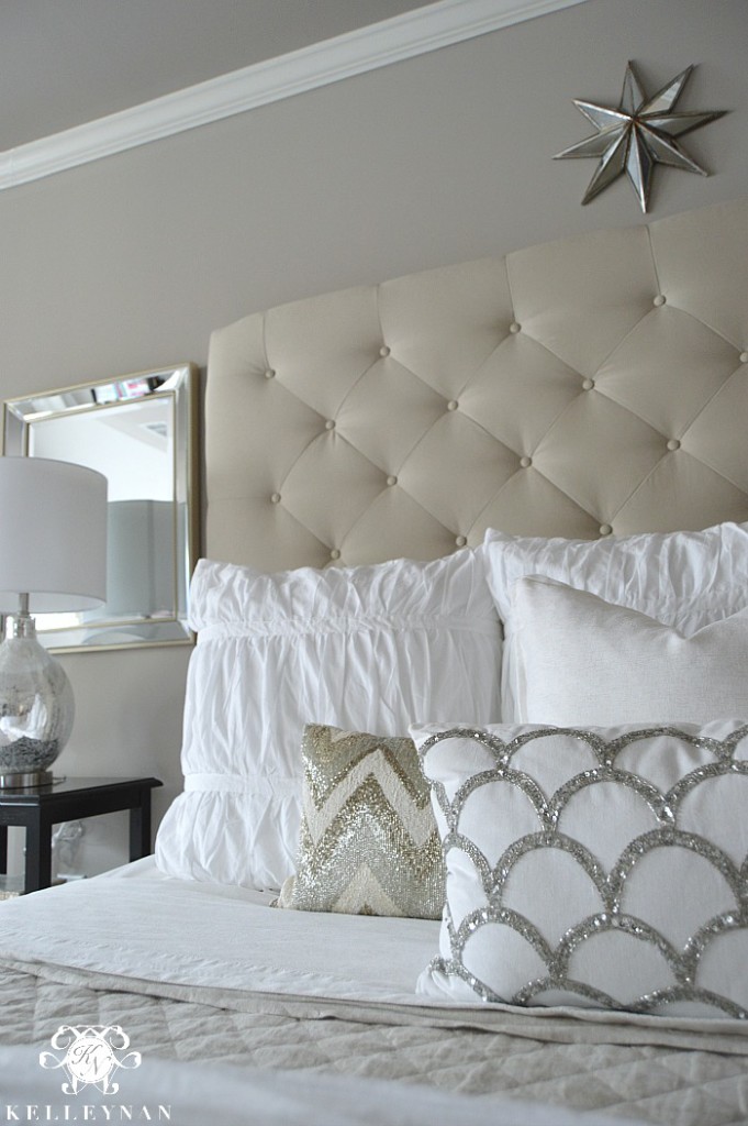 Neutral Beaded Pattern Pillows on tufted bed