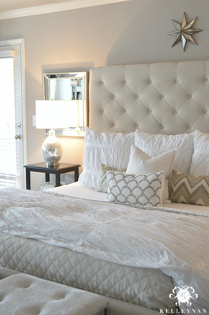 Pottery Barn Tall Lorraine Tufted Bed and white bedding