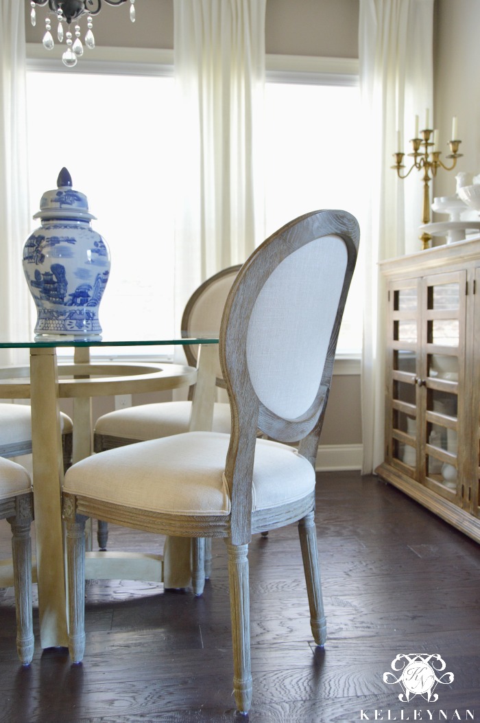 Neutral Blue and White Breakfast Nook with World Market Linen Paige Round Back Dining Chairs