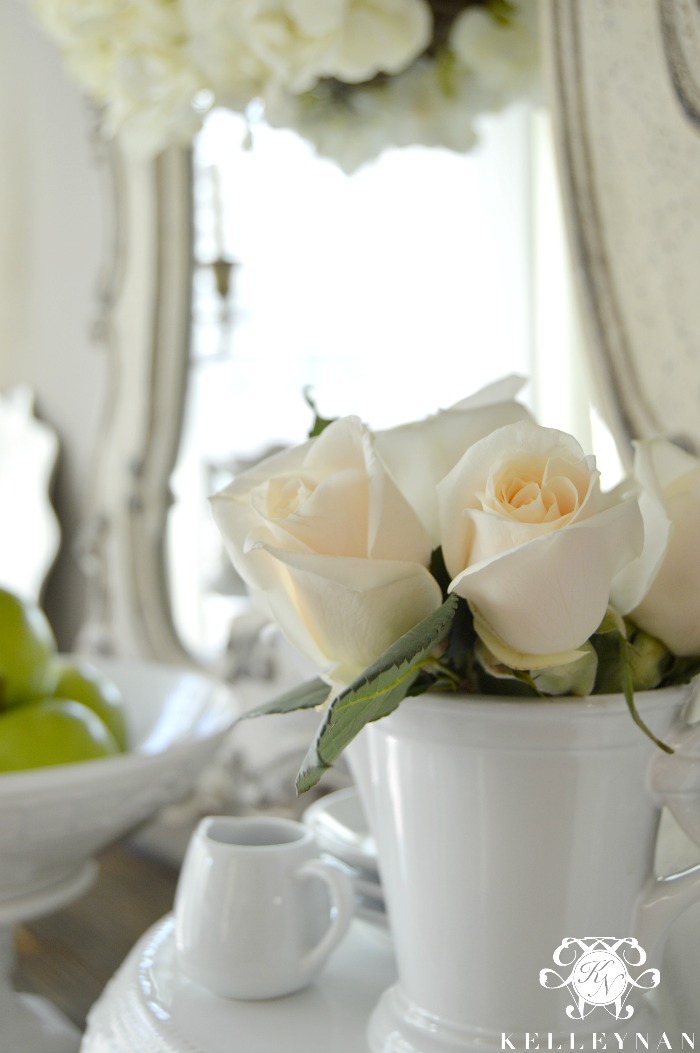 Roses and Green apples on sideboards