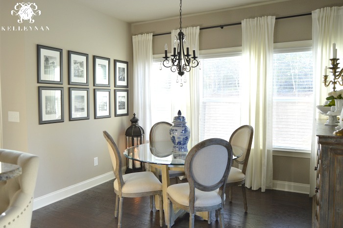 Neutral Breakfast Nook with World Market Linen Paige Round Back Dining Chairs with Gallery Wall