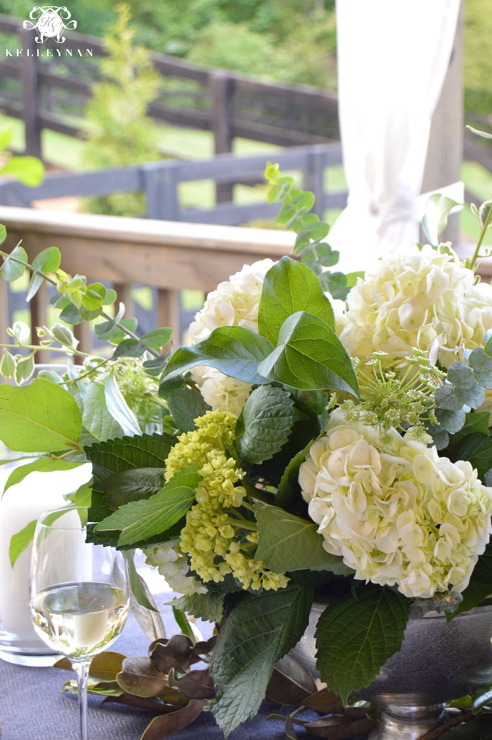 Outdoor Hydrangea Floral Arrangement with White Wine