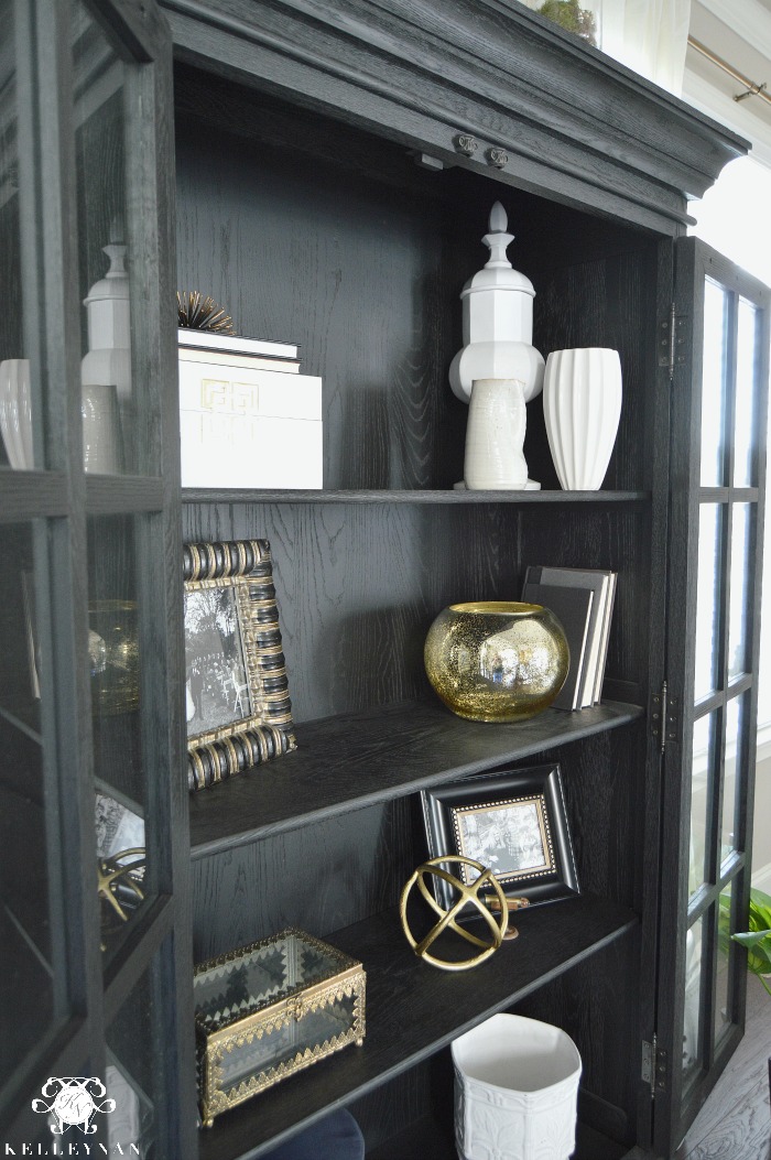 Restoration Hardware Black French Cabinet styling with white and gold accessories