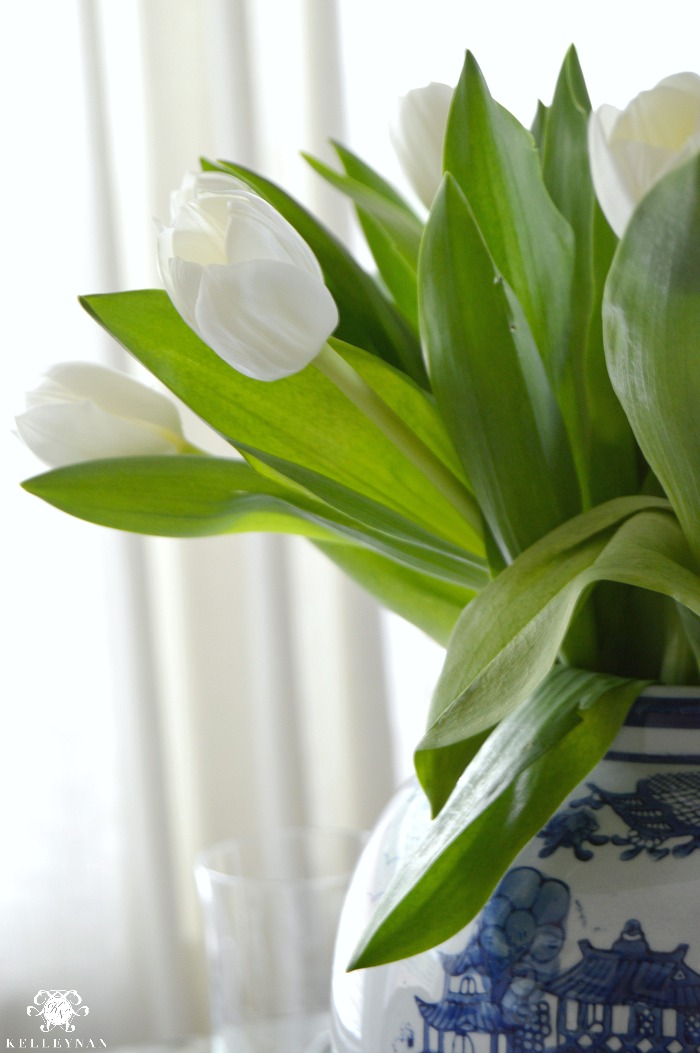 White Tulip Centerpiece in Blue and White Ginger Jar
