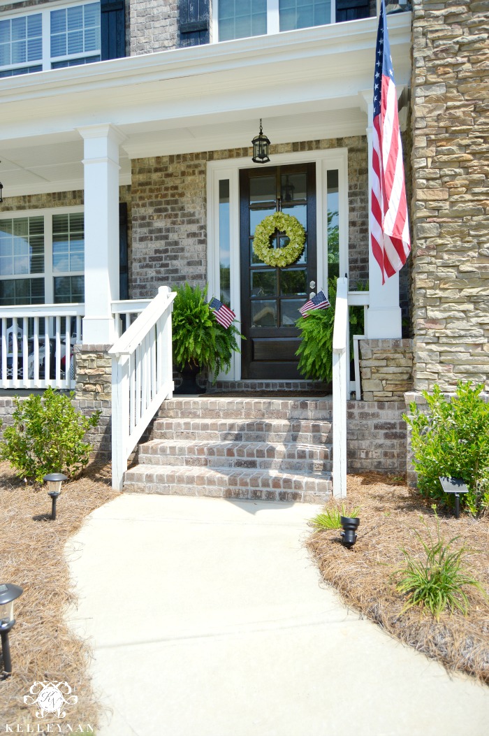 American Flag Front Porch with White Railing