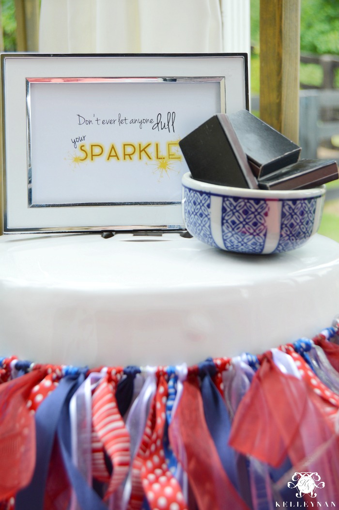 Fireworks Setup for Fourth of July with Sparkle Sign and Ribbon Garland