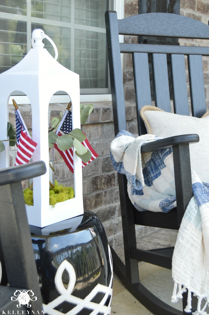 Front Porch with American Flags and Lanterns