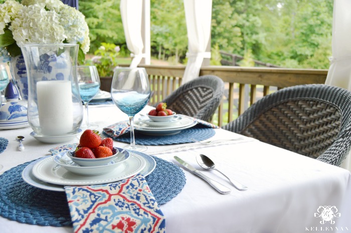 Outdoor 4th of July tablescape with strawberries table ideas