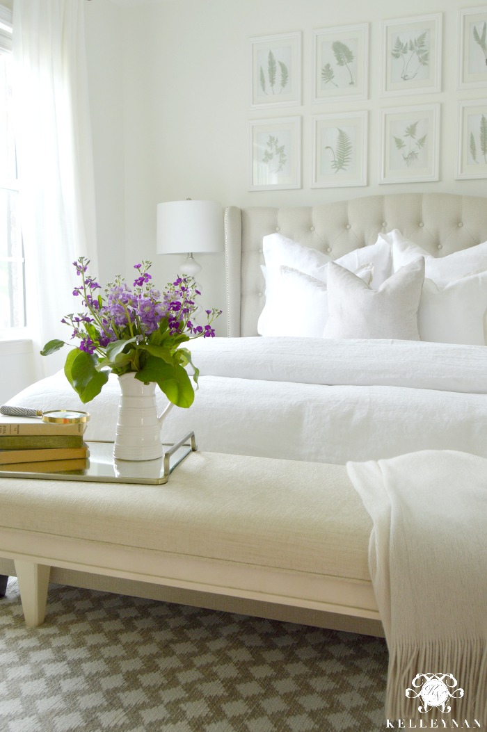 White Guest Bedroom with Fern gallery wall above bed