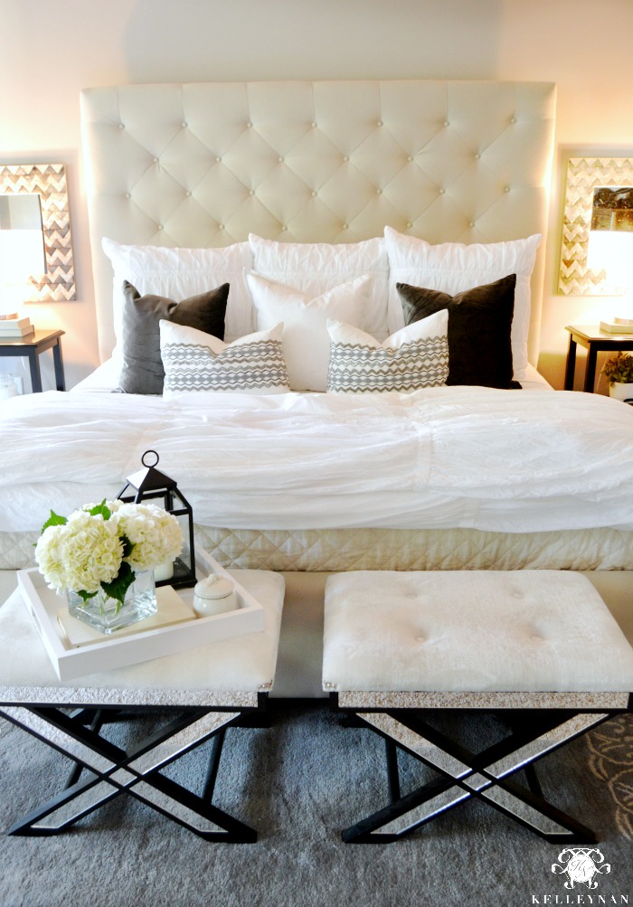 White and Gray Bed with Tufted Headbord and X Benches