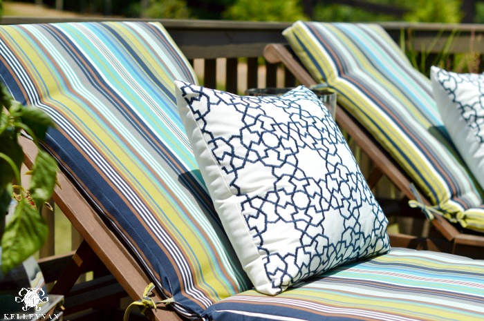 Blue and Green Striped Lounger Cushions on Patio