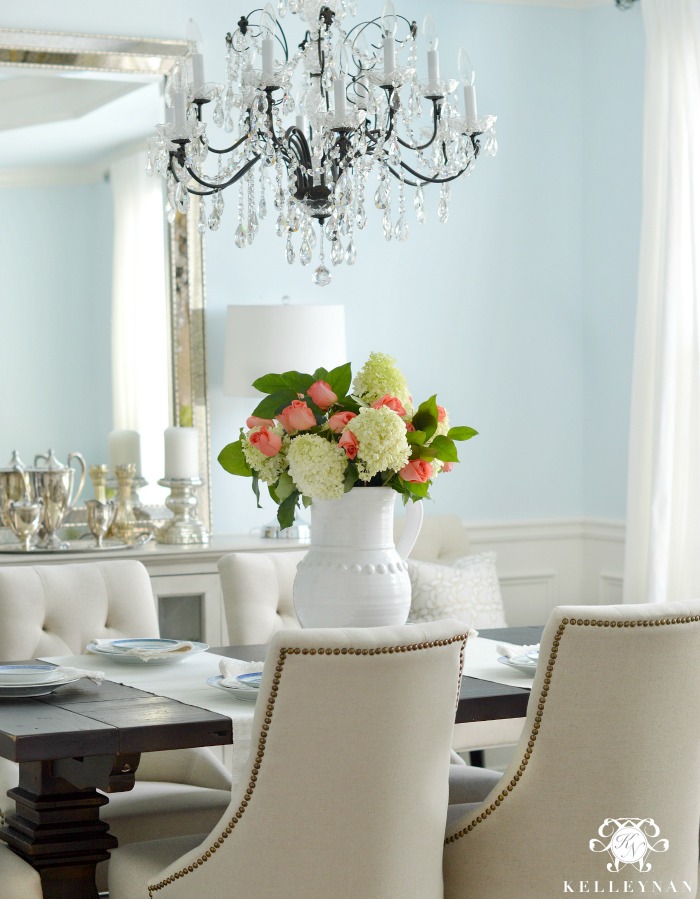 Coral Orange Roses with Limelight Hydrangeas in Blue Dining Room with Crystal Chandelier