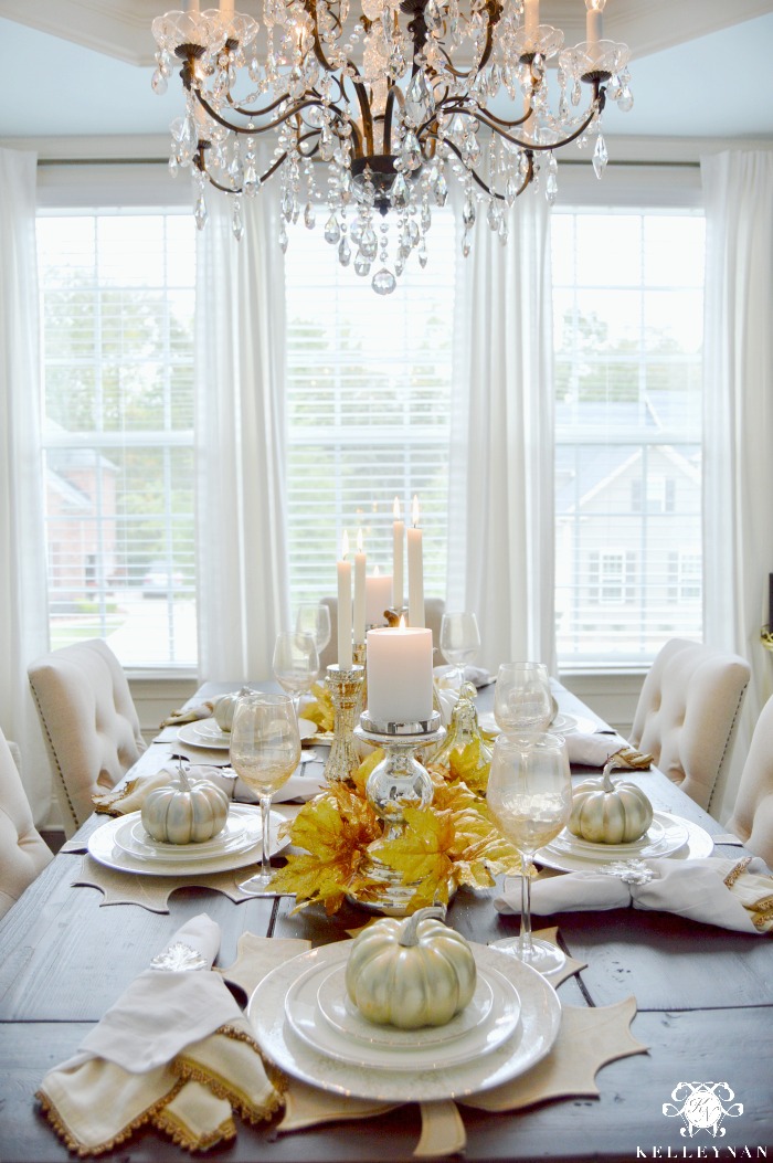 Fall Table Ideas with Gold Leaves and Pumpkins on Plates