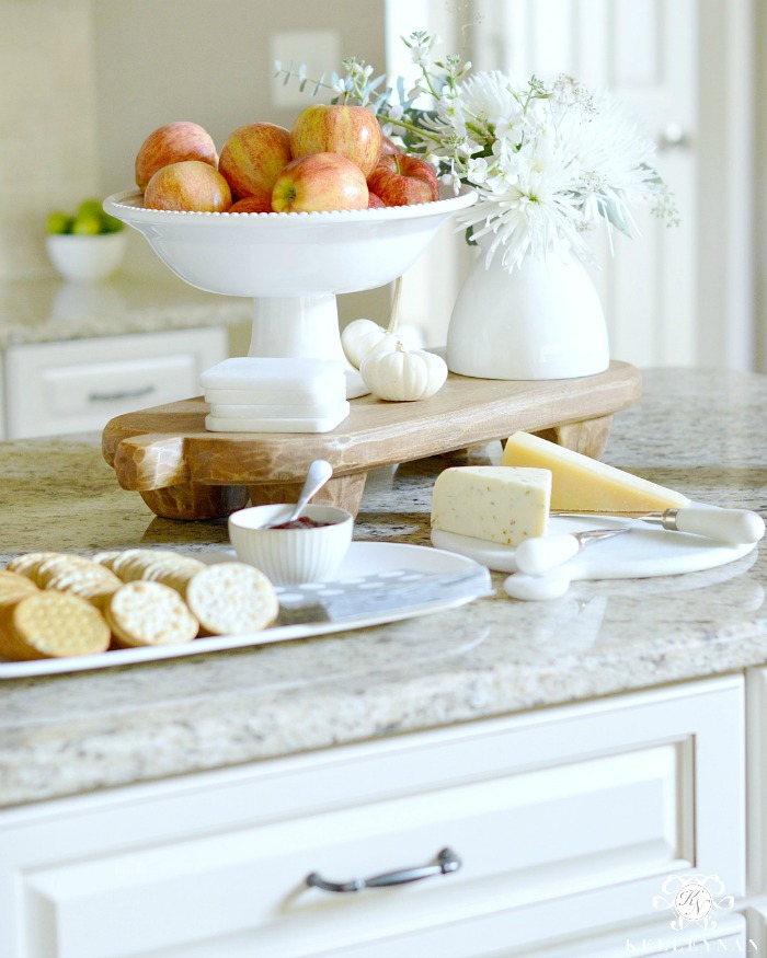 apple-centerpiece-in-kitchen-with-cheese-board