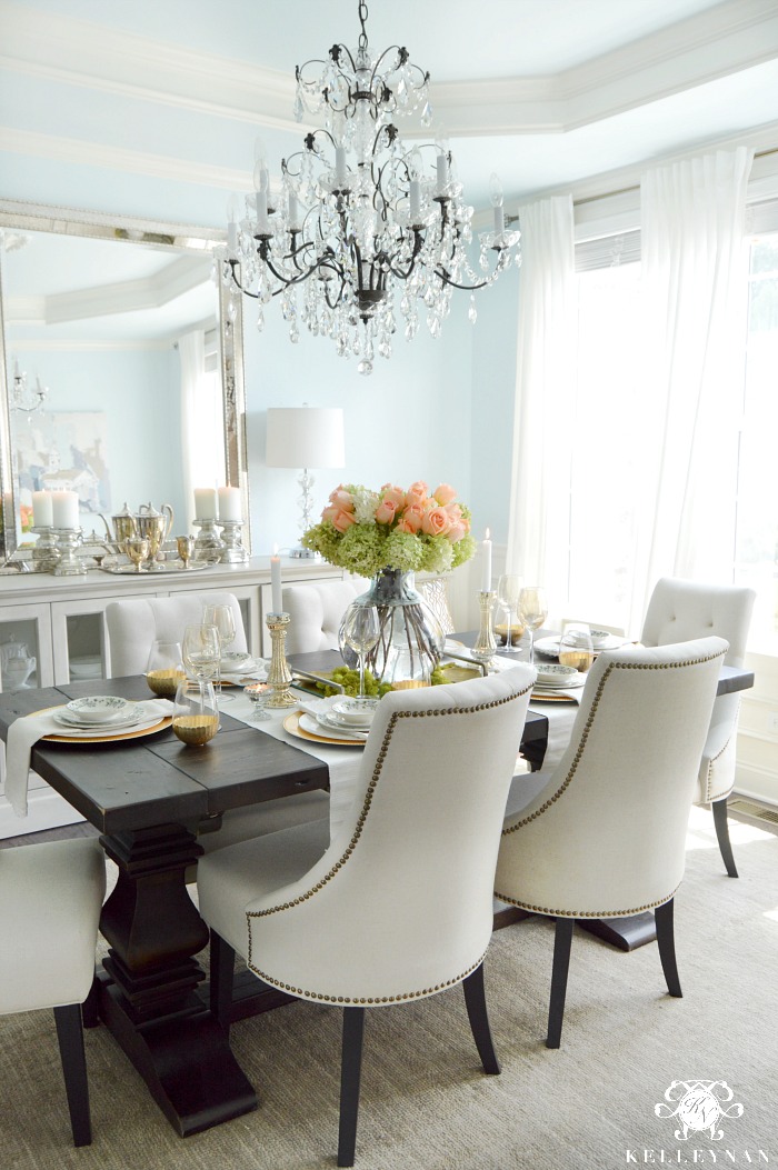 Elegant Blue Dining Room with Crystal Chandelier and World Market Lydia Chairs