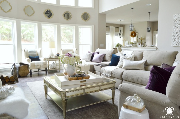 fall-living-room-with-navy-and-plum-pillows-and-neutral-decor
