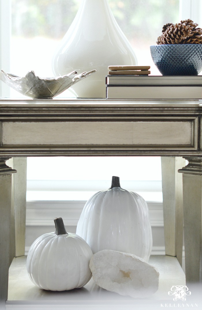 fall-vignette-with-white-pumpkins-and-pinecones-on-side-table