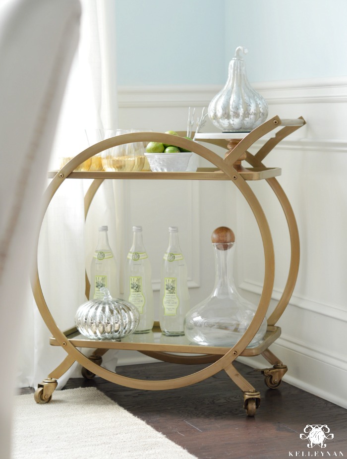 styled-gold-and-green-bar-cart-with-pumpkins