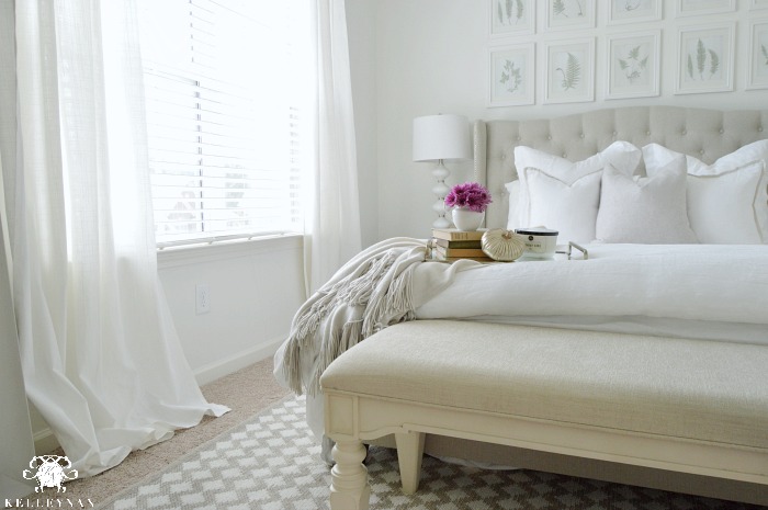 white-guest-bedroom-with-fall-purple-mums
