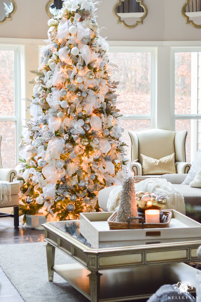big-white-and-silver-and-gold-elegant-christmas-tree-in-white-great-room-living-area