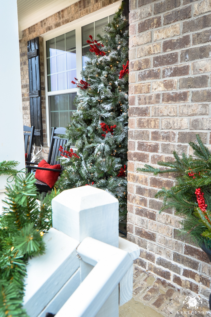 flocked-christmas-tree-on-front-porch