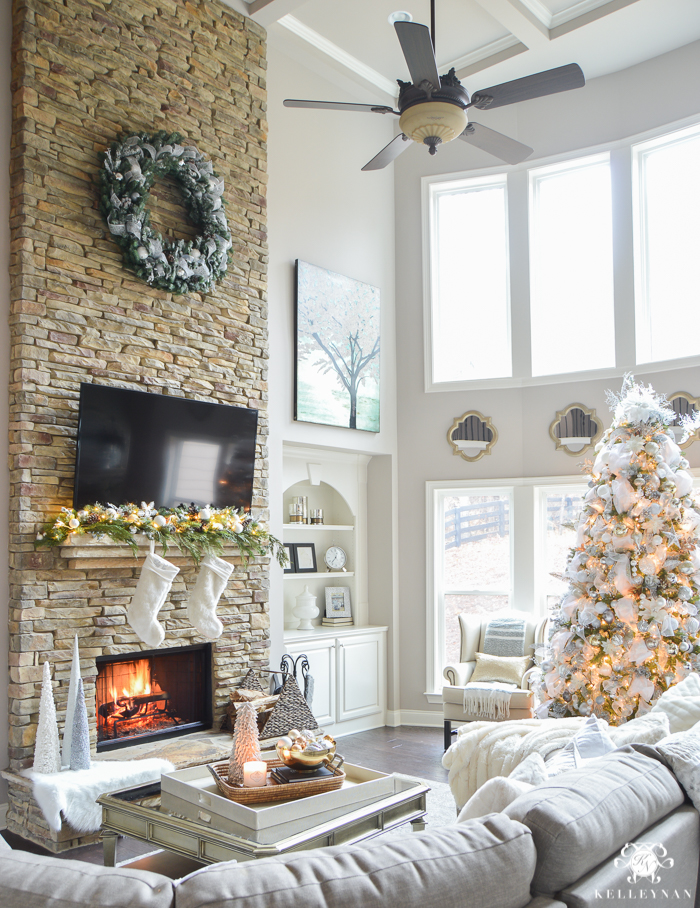 stacked-stone-christmas-fireplace-in-two-story-great-room-with-coffered-ceiling