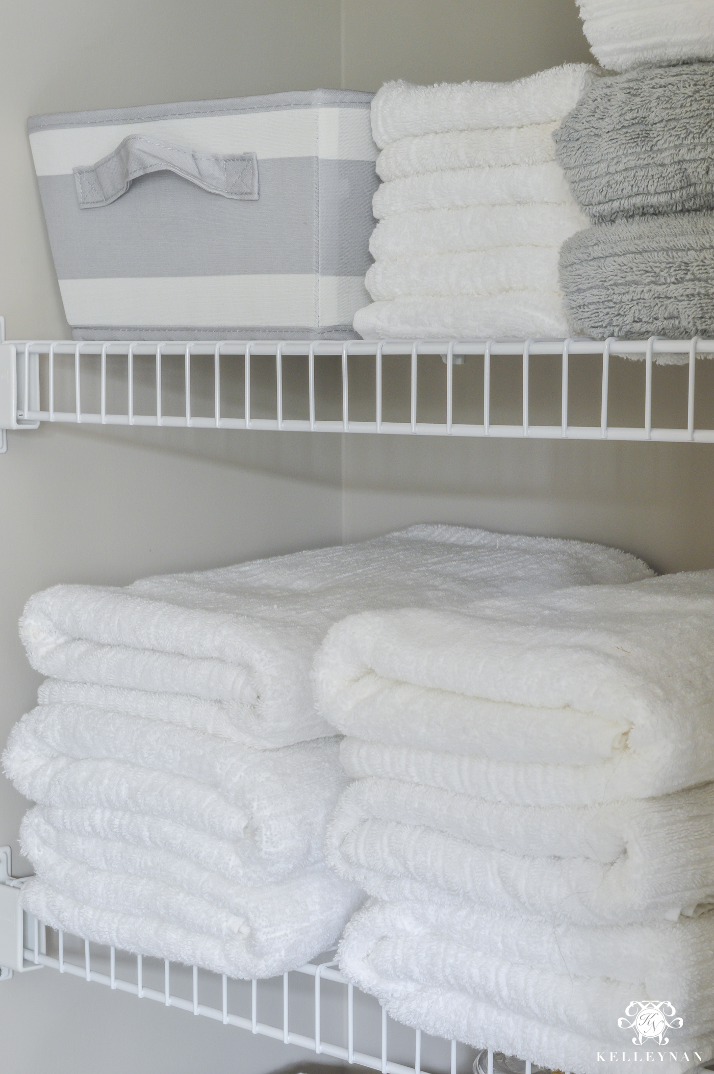 https://kelleynan.com/wp-content/uploads/2017/01/Organized-Bathroom-Linen-Closet-with-Towels-and-Baskets-6-of-14.jpg