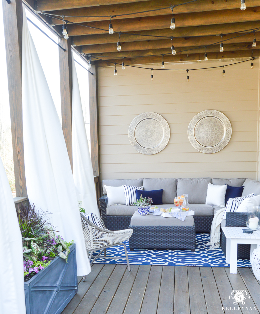 Outdoor curtains on back porch - bue and white outdoor living