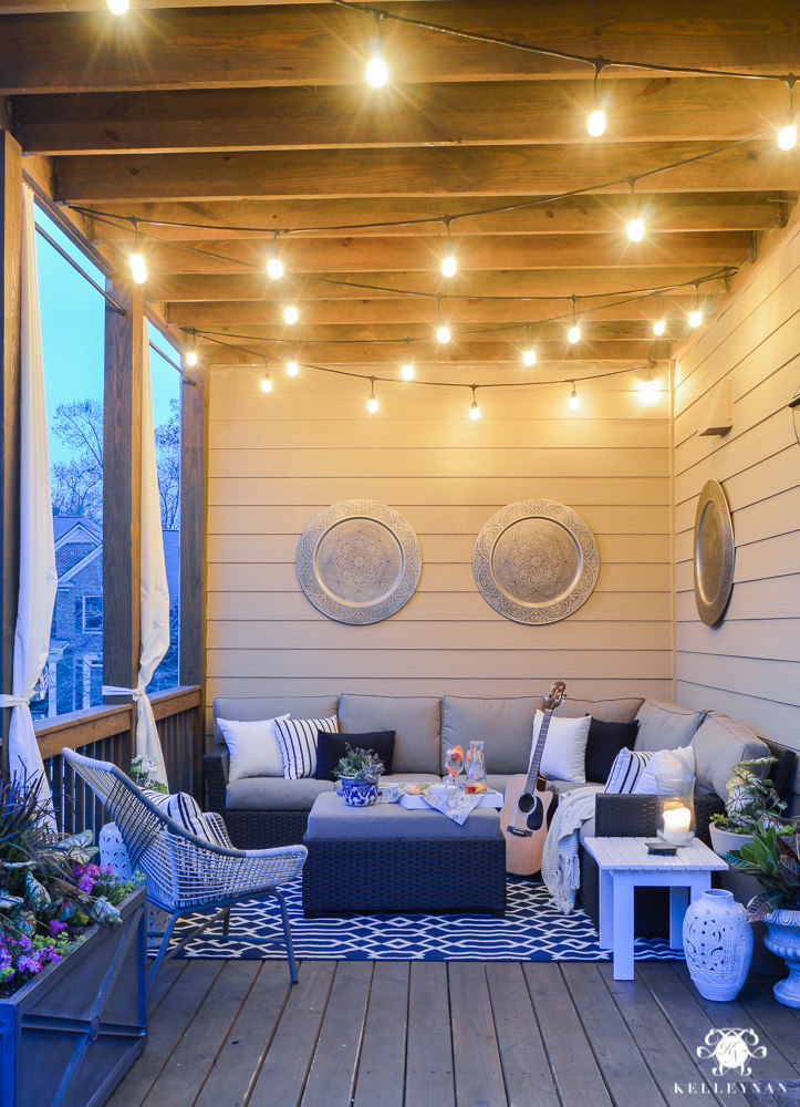 Twinkle lights on the back porch- cozy outdoor living