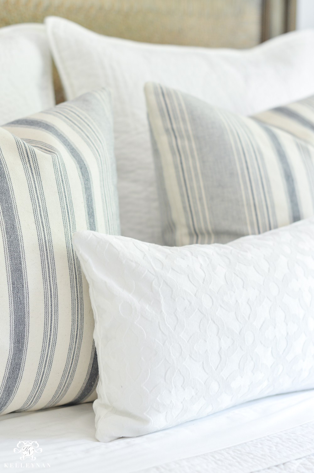 One Room Challenge Blue and White Guest Bedroom Reveal Before and After Makeover- queen bed pillow arrangement