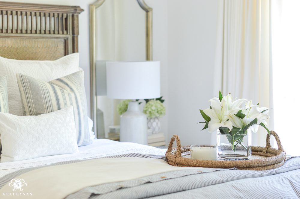 One Room Challenge Blue and White Guest Bedroom Reveal Before and After Makeover- woven bed tray with flowers