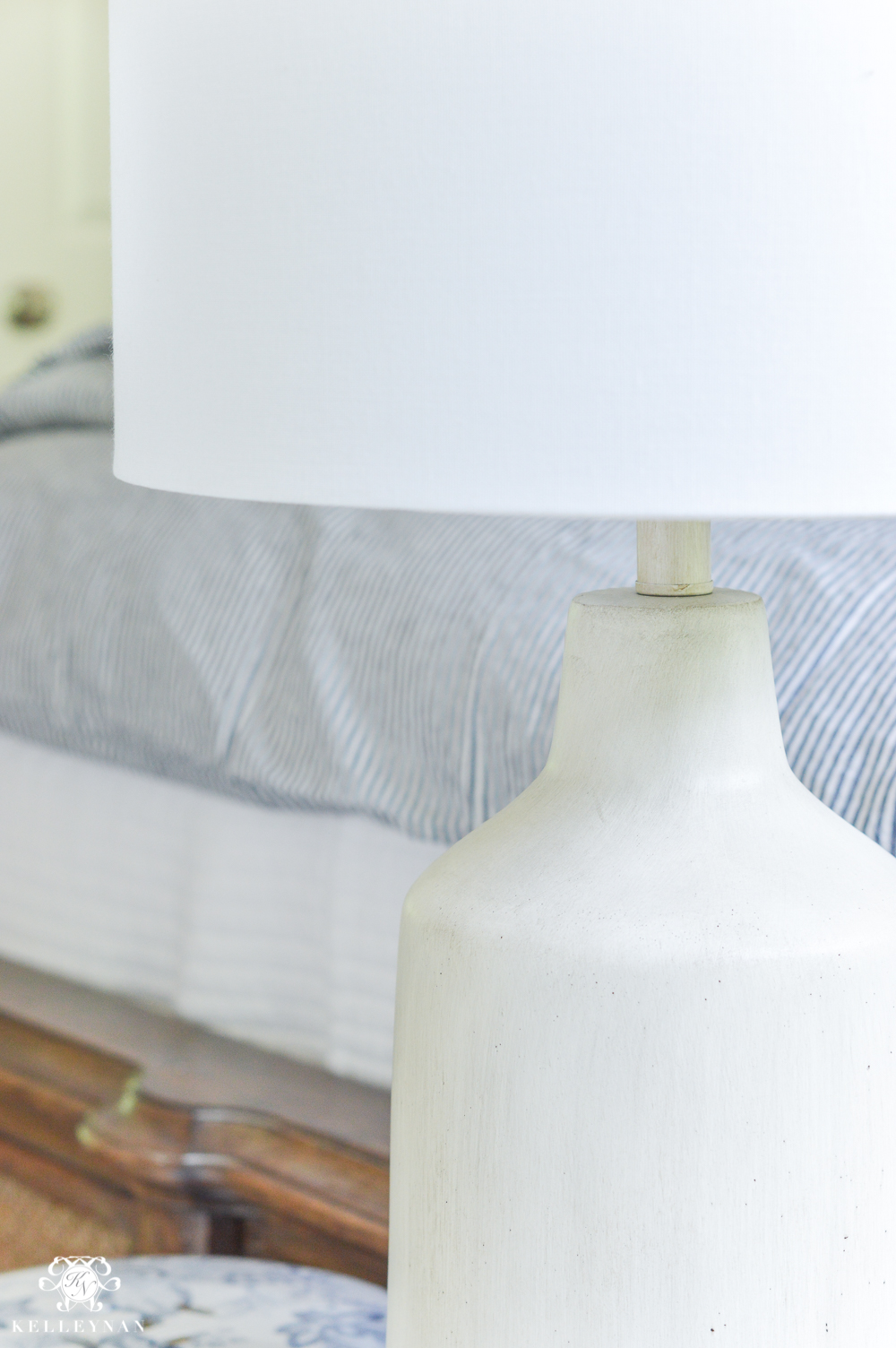 One room challenge week 4 blue and white guest bedroom-cement look lamp