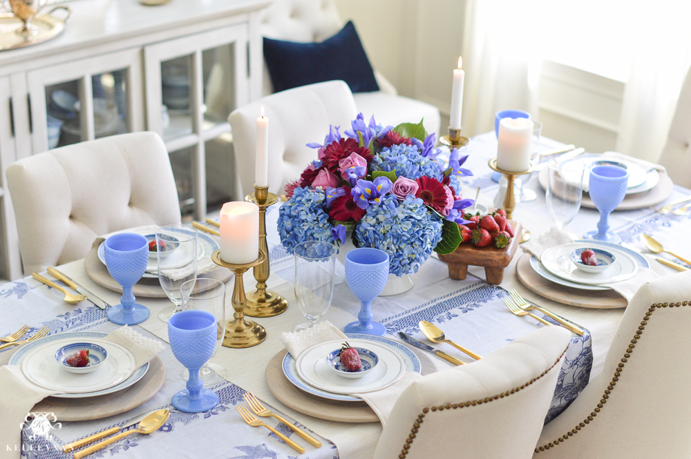 Purple and Blue floral centerpiece on Mother's Day table