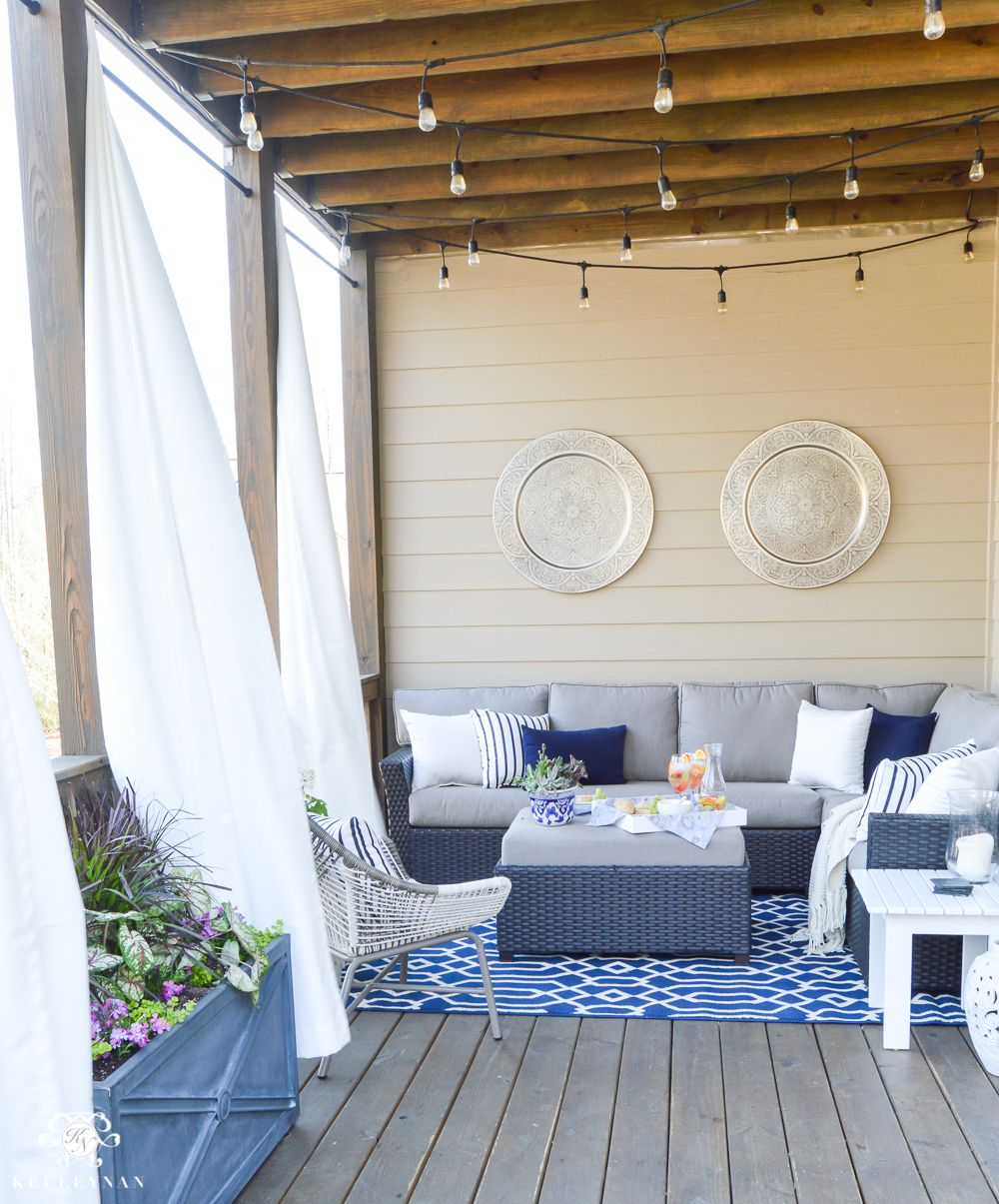 Shades of Summer Home Tour Decorated Back Porch with Sectional and Twinkle Lights and Outdoor Curtains