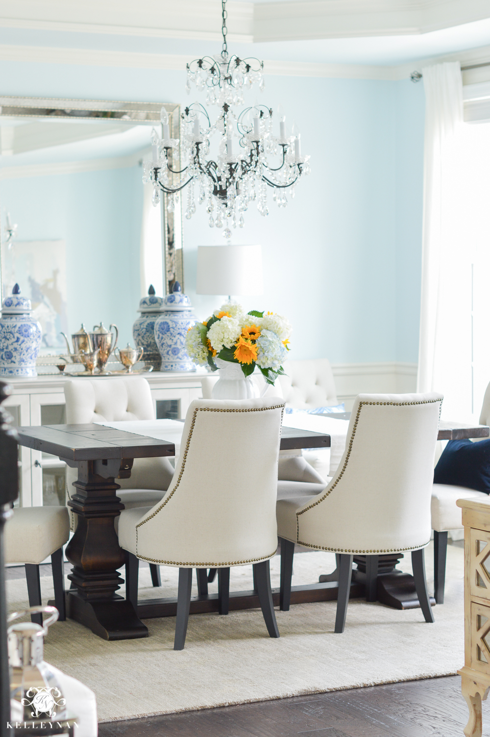 Shades of Summer Home Tour with Neutrals and Naturals- blue dining room with elegant chandelier- lauren's surprise by sherwin williams