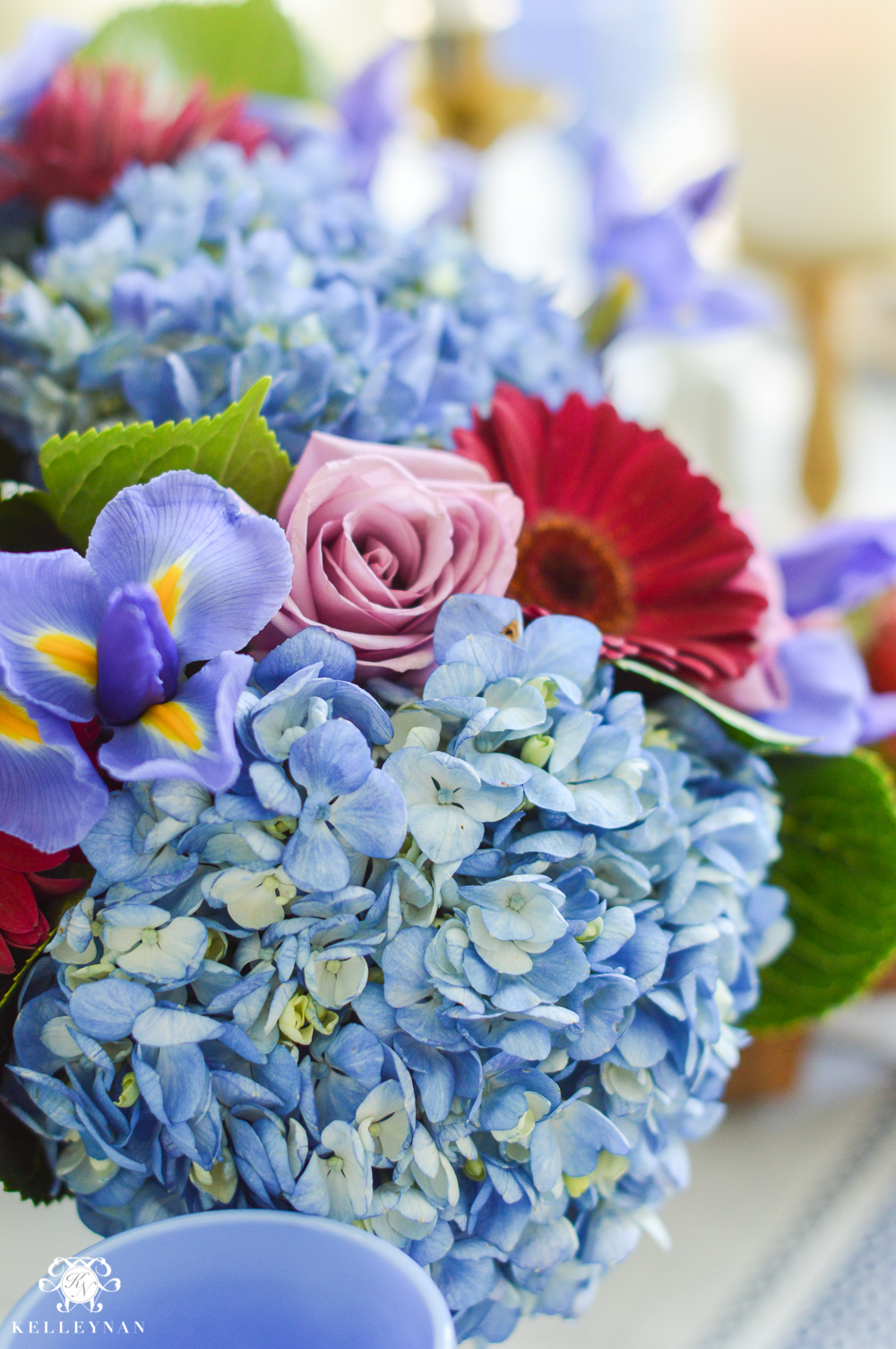 jewel tone floral centerpiece arrangement in soup tureen