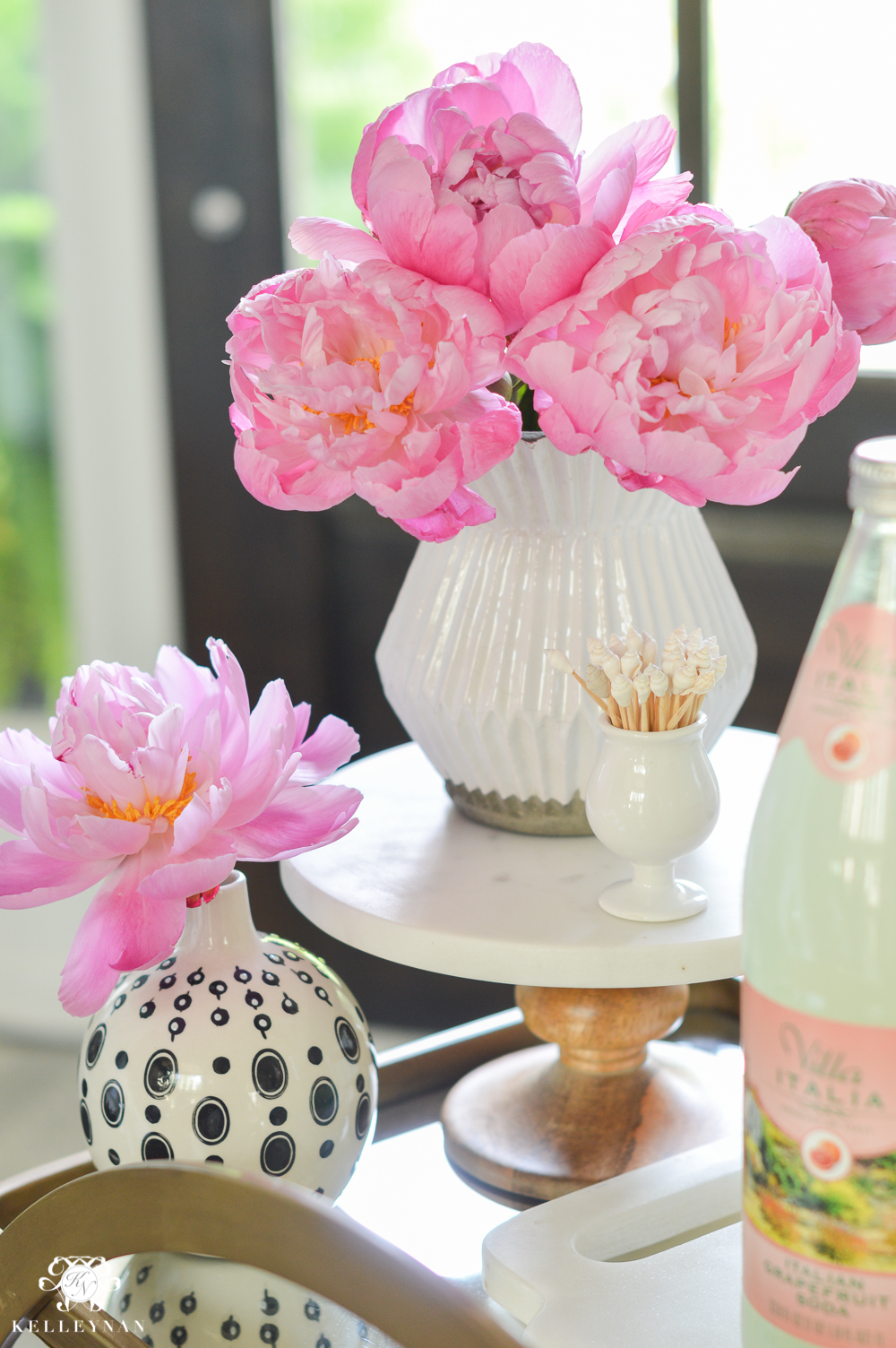 Easy Tropical Bar Cart with Peonies and Pineapple- flower stylying on World Market marble pedestal