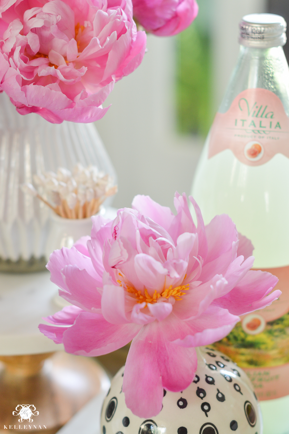 Easy Tropical Bar Cart with Peonies and Pineapple- mixing in bud vase with regular vase