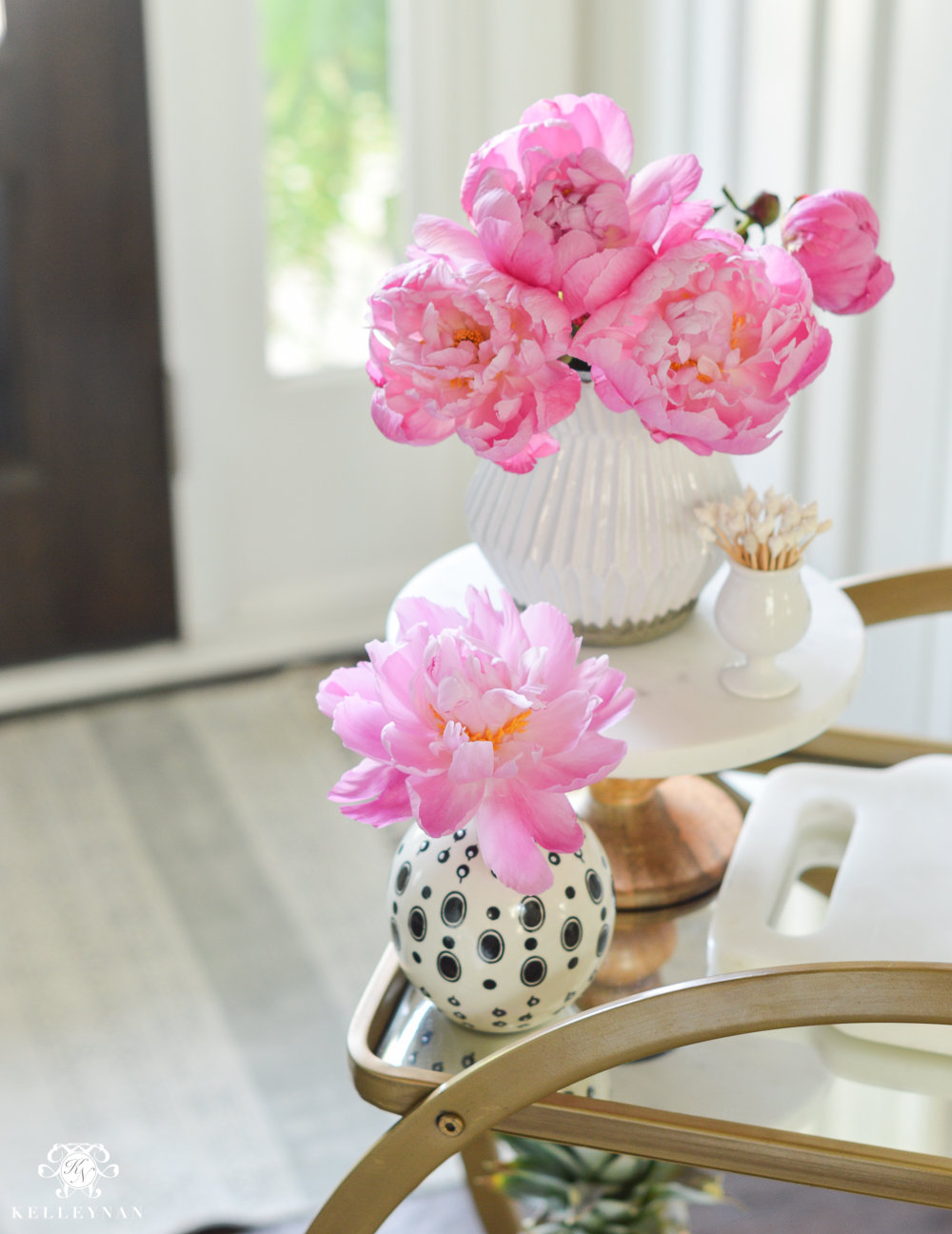 Easy Tropical Bar Cart with Peonies and Pineapple-peonies in black and white west elm vase