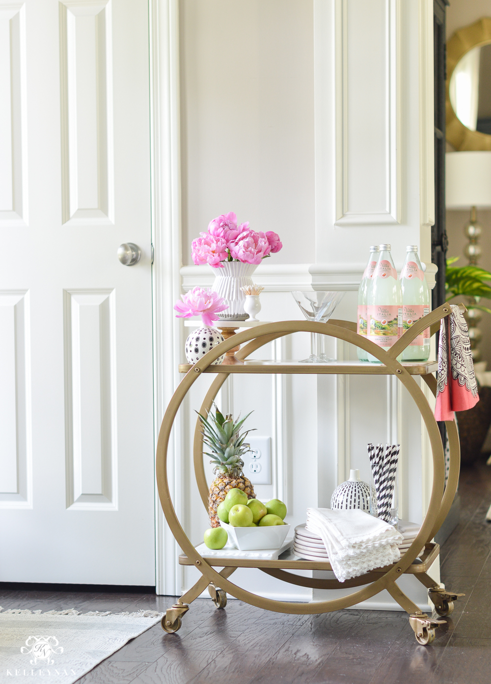 Easy Tropical Bar Cart with Peonies and Pineapple- set up in foyer