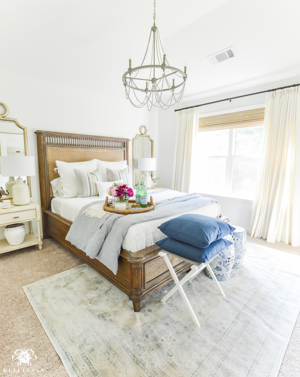 https://kelleynan.com/wp-content/uploads/2017/06/Guest-Room-Essentials-What-every-guest-bedroom-should-have-blue-and-white-guest-bedroom-with-peonies.jpg