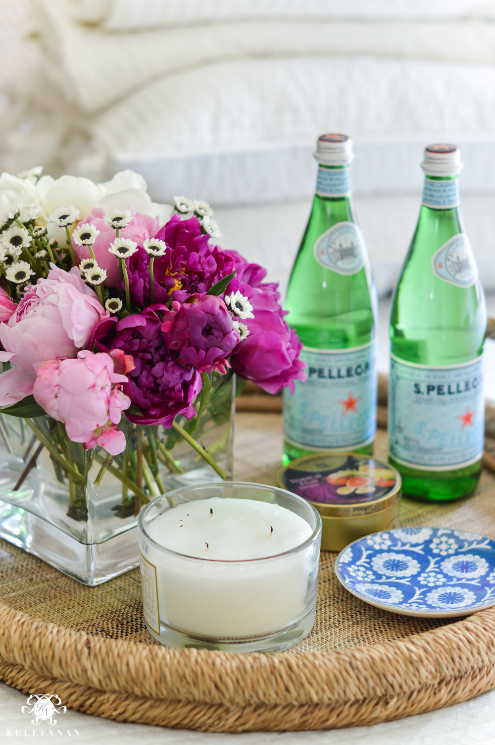 Guest Room Essentials- What every guest bedroom should have- woven tray with san pellegrino