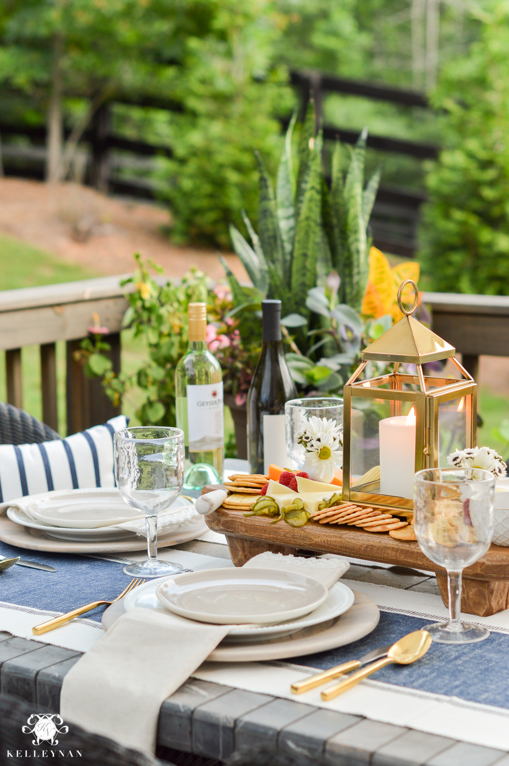 Outdoor Entertaining and Table Ideas with Cheese board appetizer centerpieces- blue and white outdoor place setting