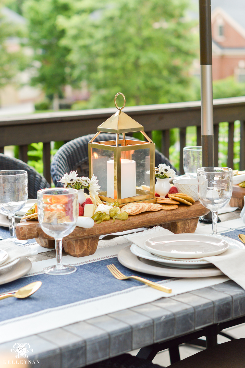 Outdoor Entertaining and Table Ideas with Cheese board appetizer centerpieces- wooden paddle boards from pottery barn