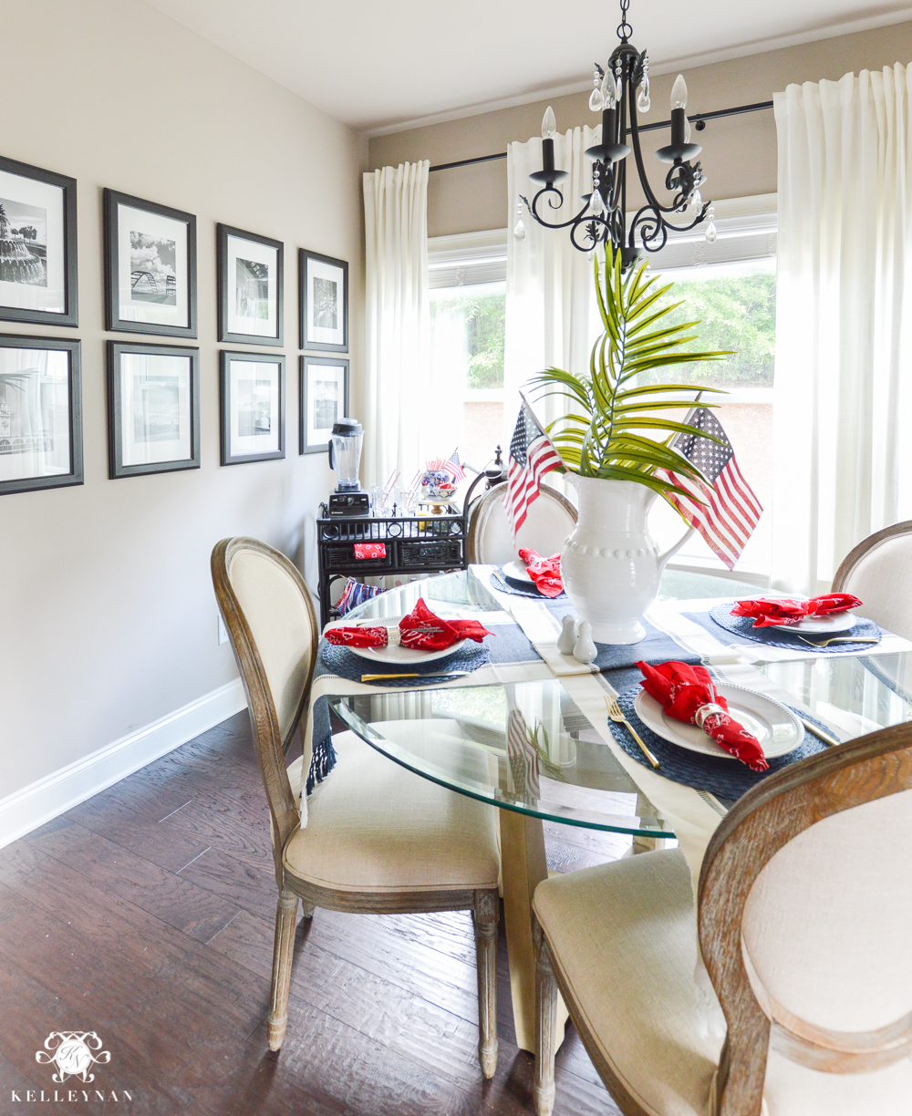 Fourth of July Decor Flags in vases as centerpiece