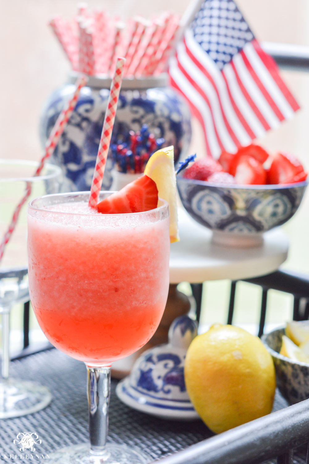 Fourth of July Decor and Strawberry Lemon-Limeade Rum Slush Drink Recipe on bar cart