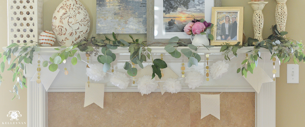 Southern Garden Party Bridal Shower Ideas- fireplace garland with pompoms, banners and greenery