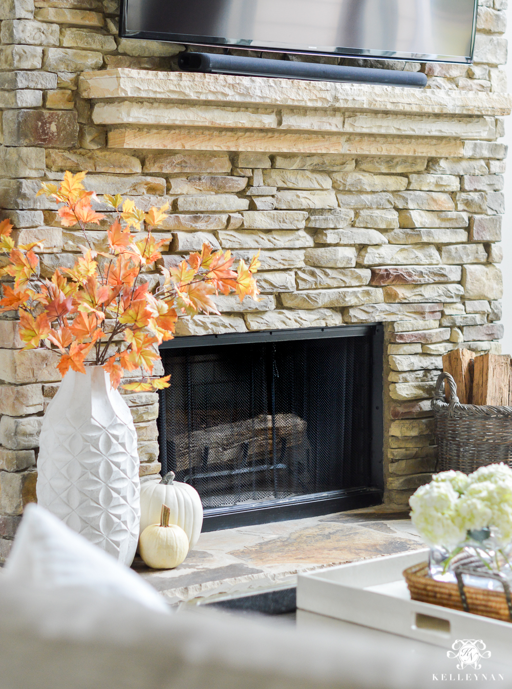 2017 Fall Home Tour with Yellow and Orange Leaves- fireplace hearth with leaves