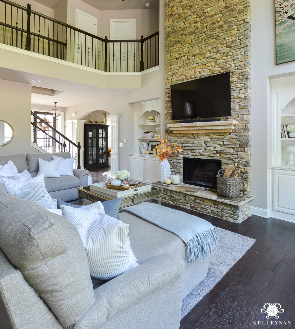 2017 Fall Home Tour with Yellow and Orange Leaves- two story living room with tv over fireplace