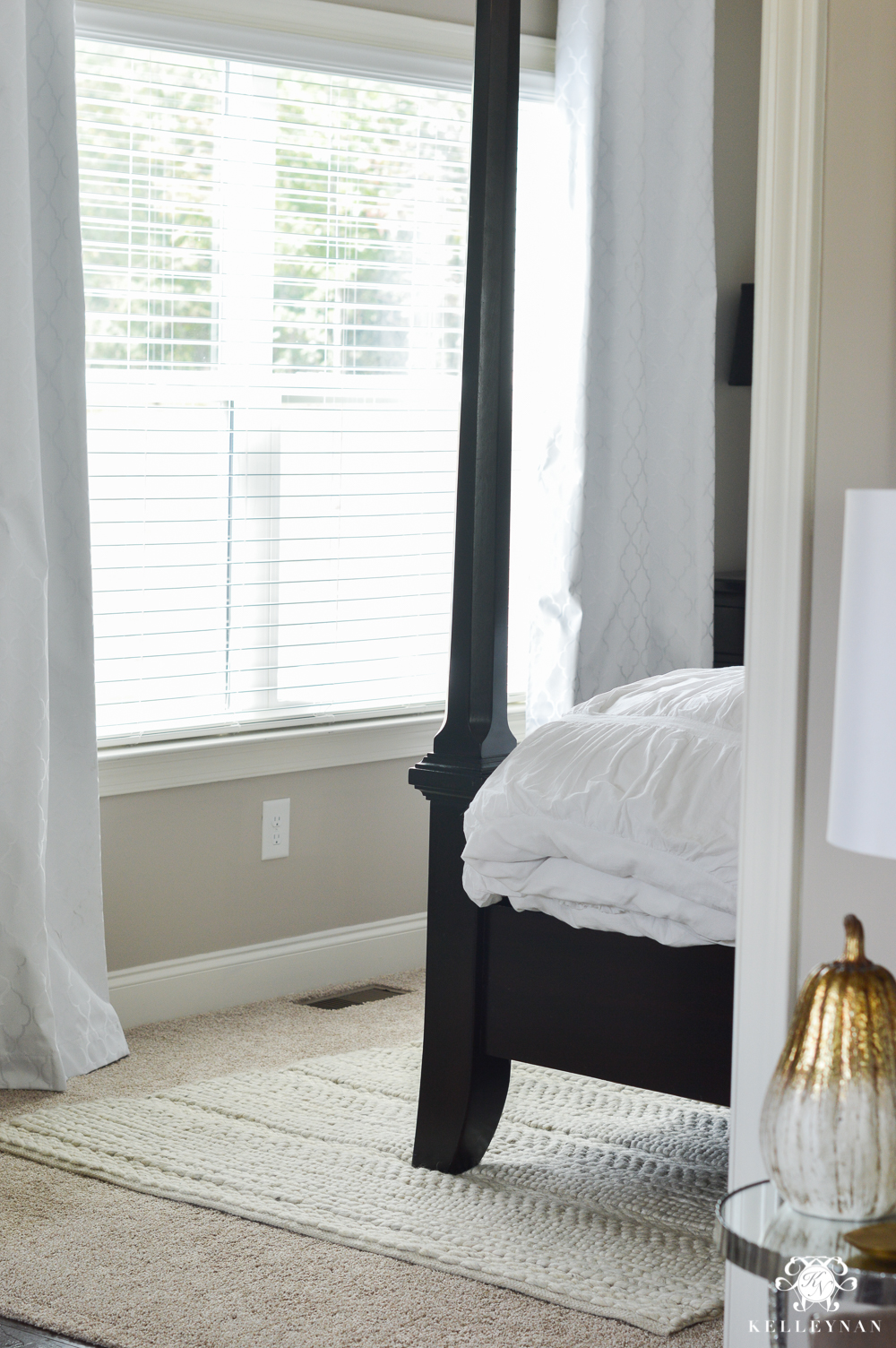 Layering Rugs Under Beds